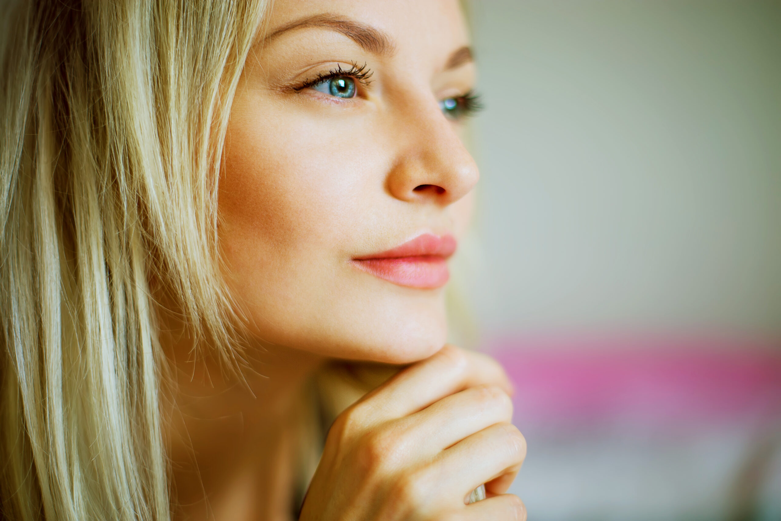 portrait of a woman holding her chin with her hand