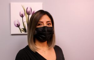 Sonia Tipan with a mask