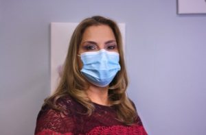 Olga Sanchez with a mask