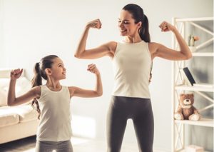 mom and daughter exercising 